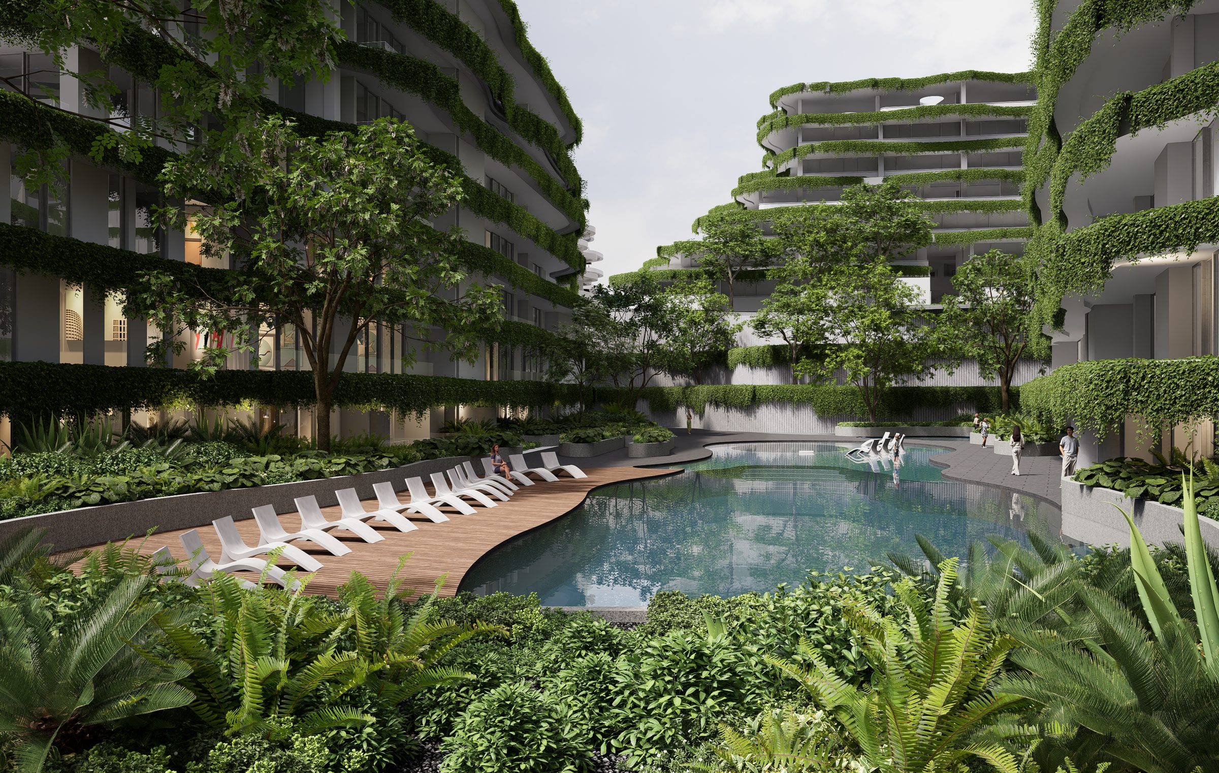 Layan Verde — pool deck and green-clad buildings